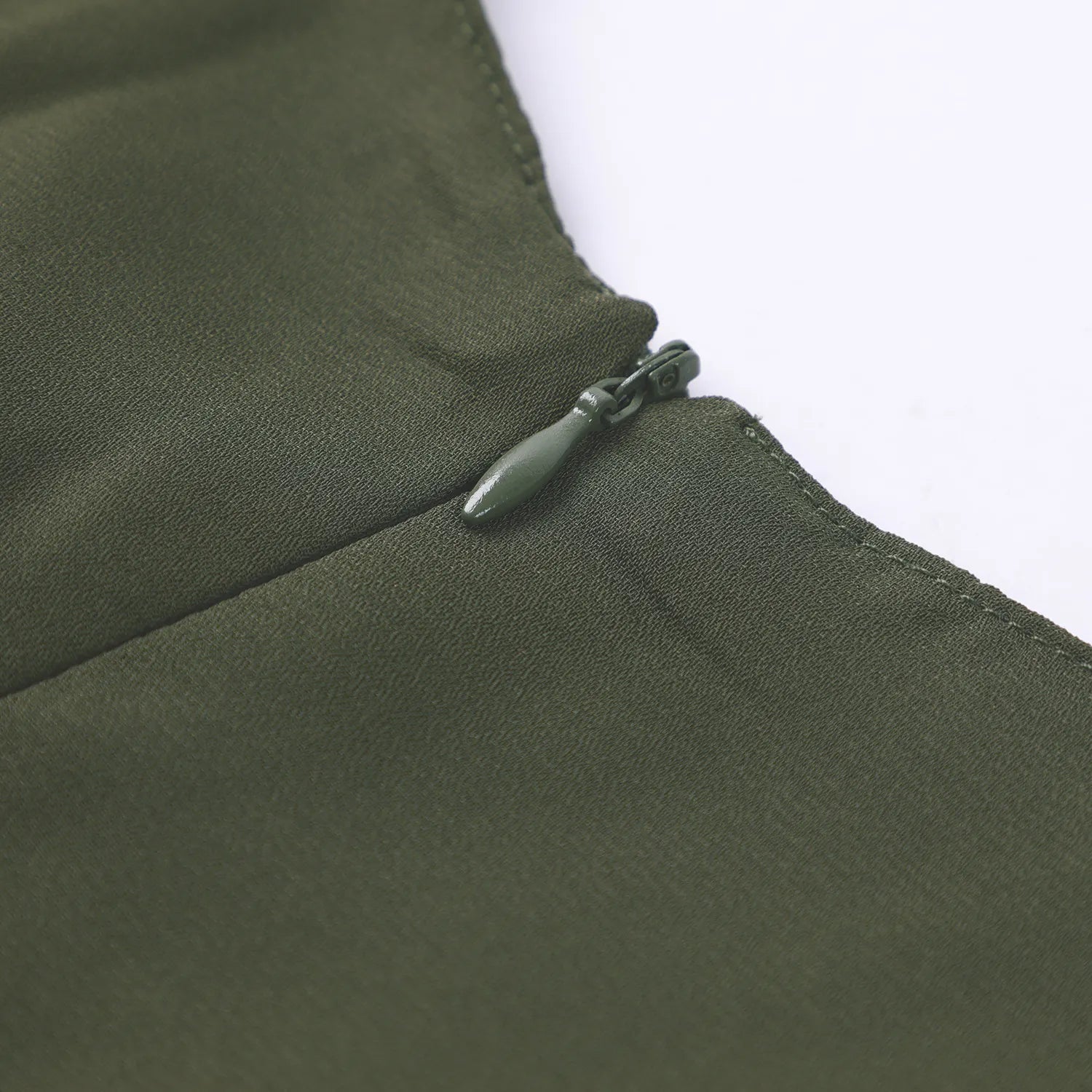 Gilded Printed Elegant Abaya by Trend Den featuring a close-up of a green zipper detail on soft fabric.
