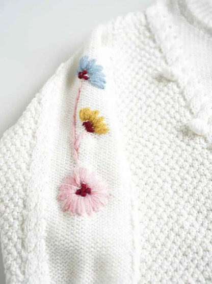 Baby girls hand-embroidered floral cotton sweater in white with delicate pastel flowers by trend den