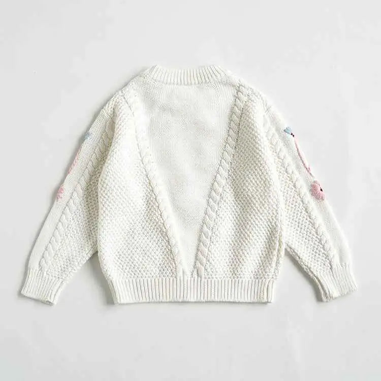 Baby girls hand-embroidered floral cotton sweater in soft white with cable knit patterns and pink embroidered sleeves