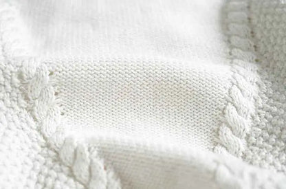 Baby girls hand-embroidered floral cotton sweater with white knitted fabric and textured cable-knit border