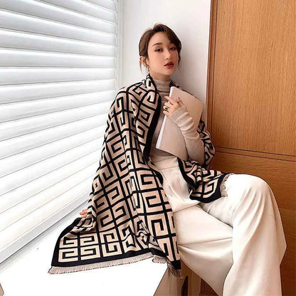 British classic cashmere double-sided scarf with black and cream geometric knit pattern and fringed edges