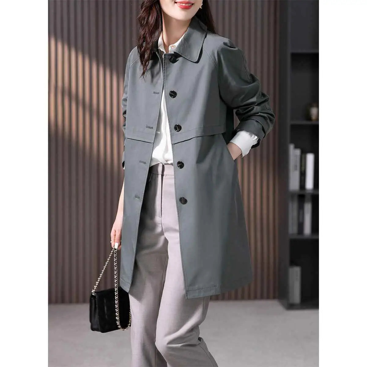 Gray british elegant mid-length trench coat with black buttons and structured collar in a straight cut design Blue Gray