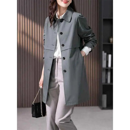 Gray british elegant trench coat with black buttons and classic collar in a mid-length straight design