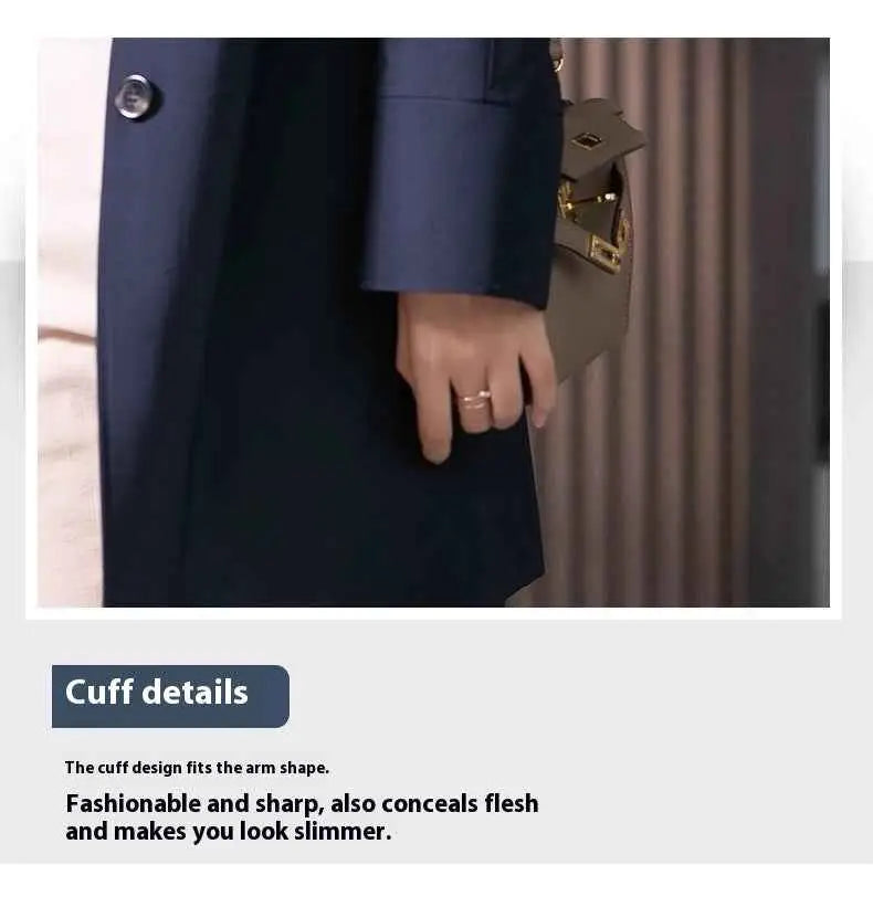 Navy blue double-breasted cuff with silver button on british elegant mid-length trench coat detail