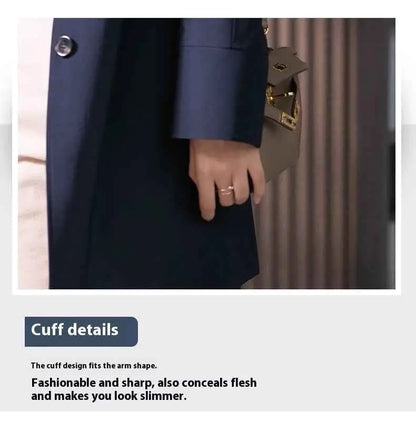 Navy blue double-breasted cuff with silver button on british elegant mid-length trench coat detail