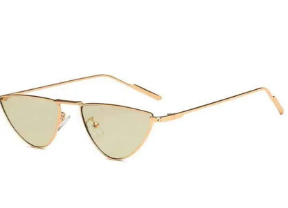 Celebrity street-style slim metal sunglasses with gold-toned cat-eye frame and light green tinted lenses Gold frame green sheet