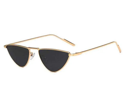 Celebrity street-style gold-toned slim metal sunglasses with dark lenses and a sleek minimalist design from trend den Gold frame grey sheet