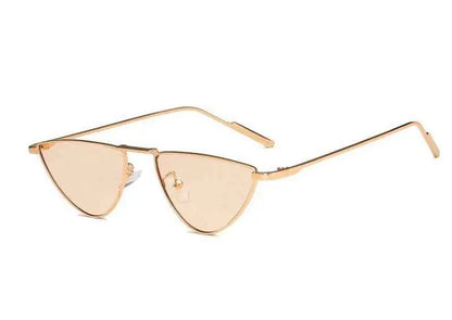 Slim metal sunglasses with a cat-eye shape, featuring a gold frame and light tinted lenses by Trend Den.