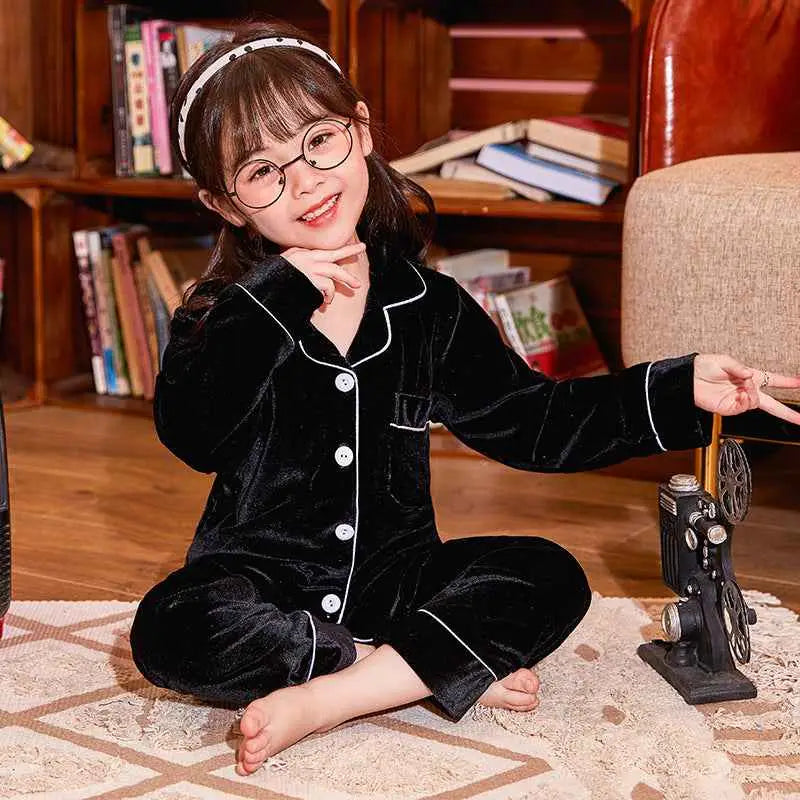 Children’s gold velvet cotton pajama set by trend den in black velvet with white piping and buttons Black