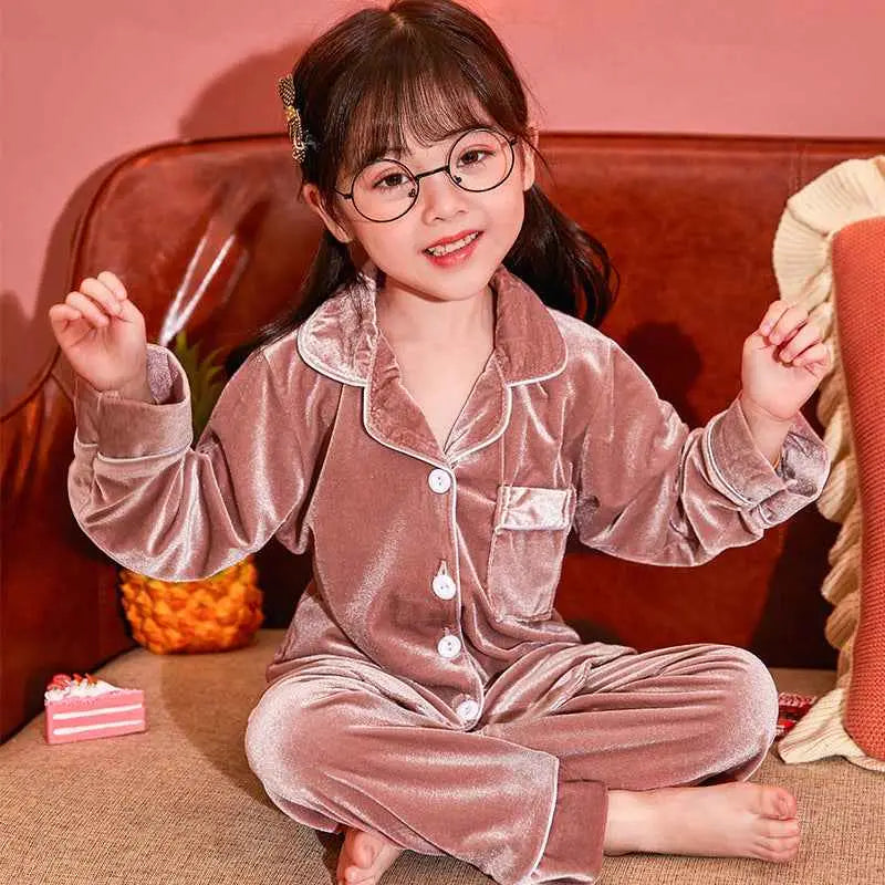 Children’s gold velvet cotton pajama set in cozy rose gold velvet with white piping and matching buttons from trend den Pink