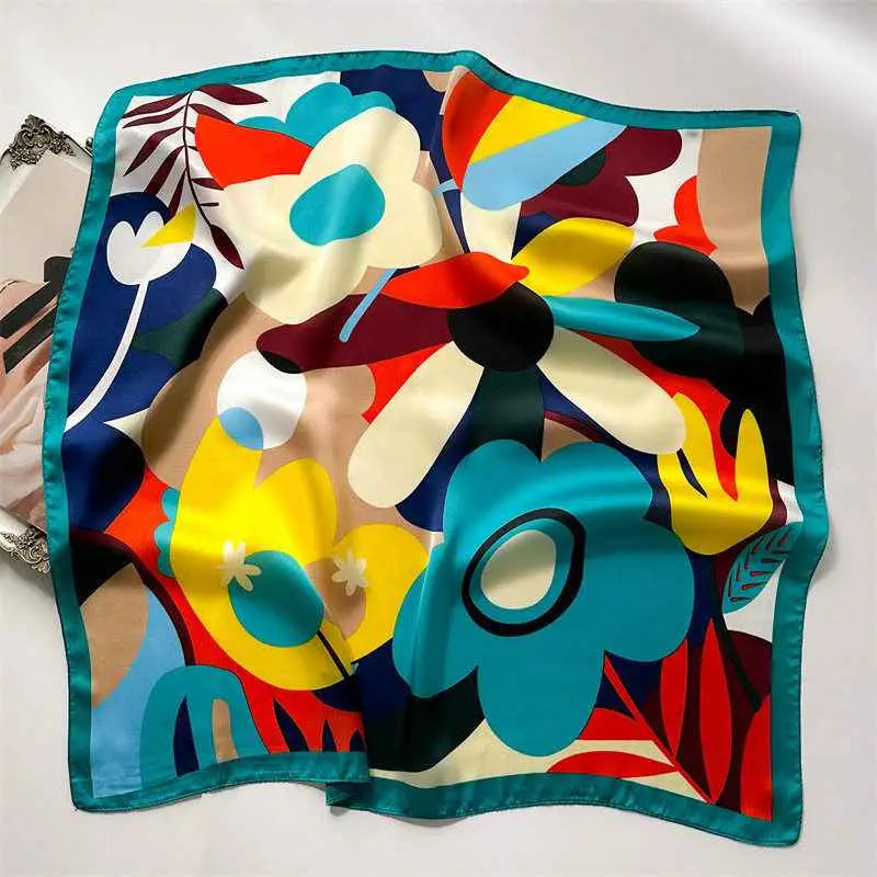 Vibrant abstract floral dopamine print silk feel square scarf with bold teal yellow red and cream patterns from trend den Dopamine Flower Blue