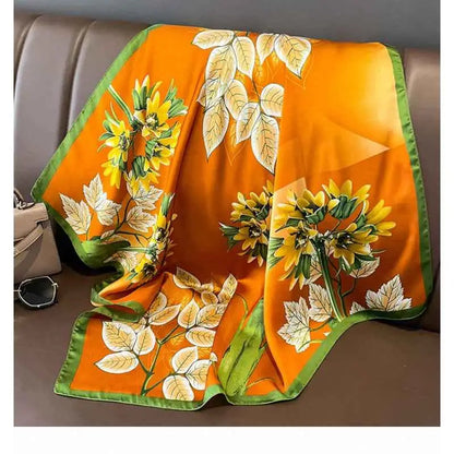 Vibrant orange dopamine-print silk feel square scarf with bold yellow sunflower pattern and green border by trend den Dopamine Flower Yellow