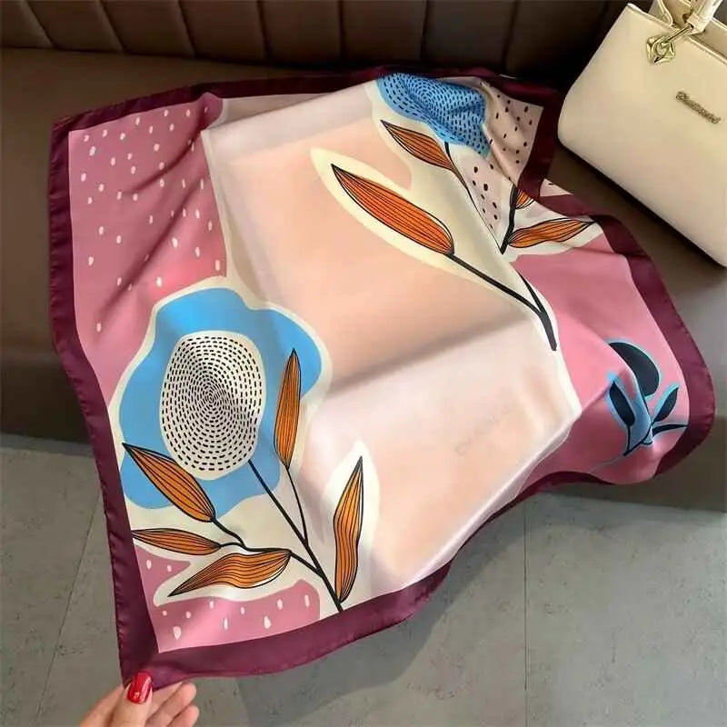 Dopamine-print silk feel square scarf with modern pink blue orange floral design and maroon border on peach background Sunflower Rose