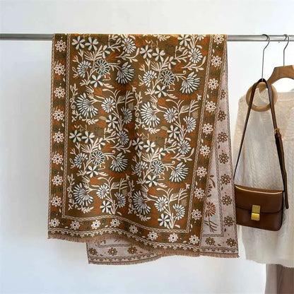 A warm brown floral cashmere-feel oversized shawl with white beige embroidery and fringed edges from trend den WT91 2