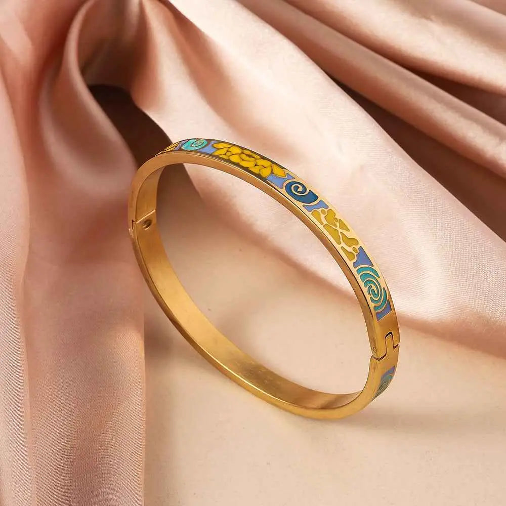 Gold bangle made of titanium steel with intricate yellow blue and turquoise floral enamel gold patterns Yellow Blue Green