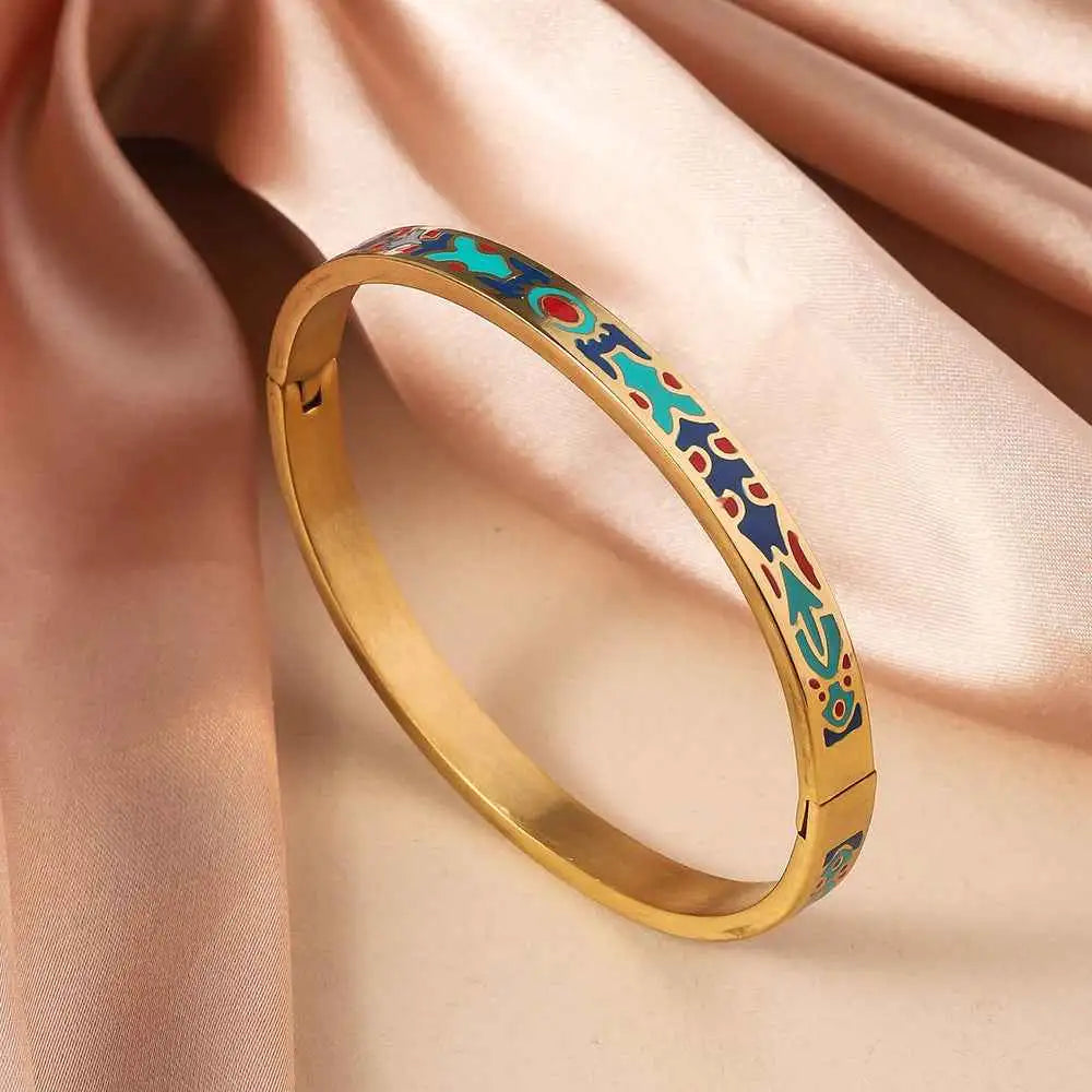 Floral enamel gold bangle featuring intricate turquoise blue and red geometric patterns on titanium steel gold bangle