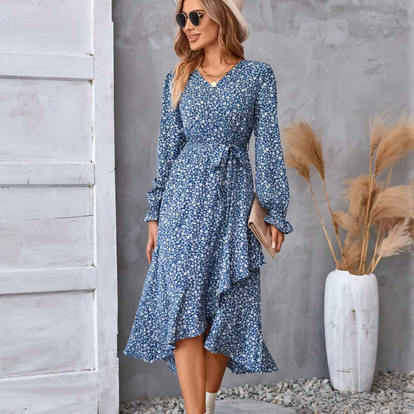 Blue floral ruffled long sleeve midi dress with ruffled hem perfect for casual and dressy occasions Blue