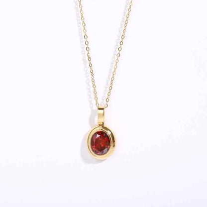 Delicate 18k gold gemstone necklace with a deep red garnet stone in a smooth bezel from trend den collection Dark Red