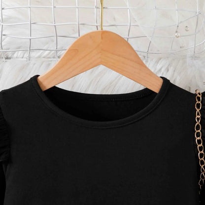 Black sleeveless top with round neckline and subtle shoulder ruching featured in girls cartoon princess dress trend den