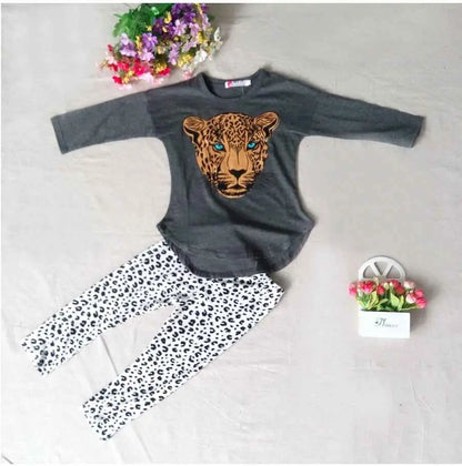 Gray long-sleeved girls leopard print top with detailed leopard face graphic featuring blue eyes and tan fur patterns Grey
