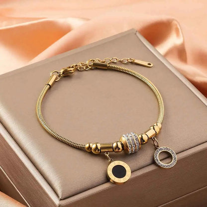 Gold-toned titanium steel charm bracelet with rhinestone barrel bead and gold shell charm adjustable design Hollow Double Round