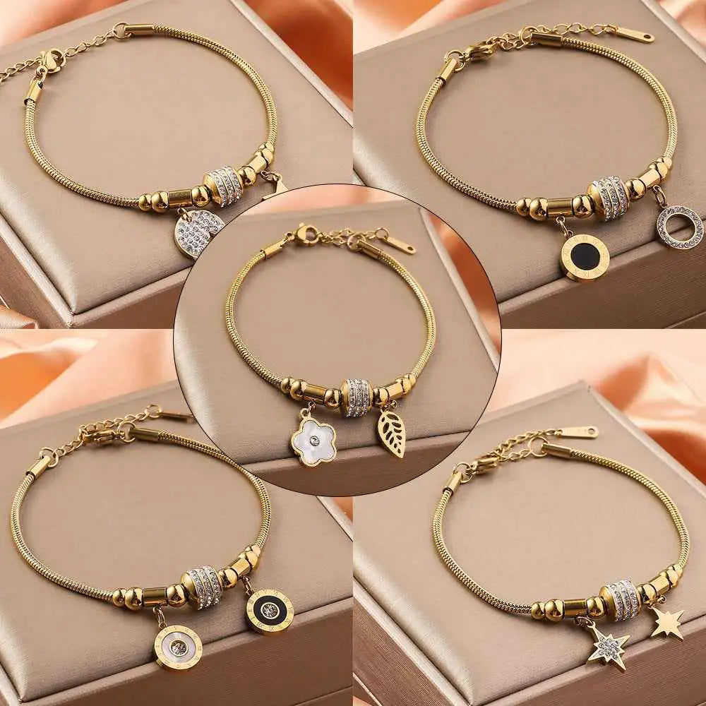 Gold shell charm bracelet adjustable gold-toned titanium steel snake chain with decorative beads and dangling charms