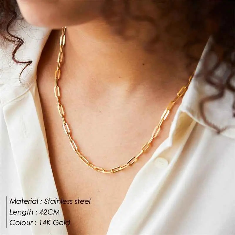 Gold u-shape chain necklace 42cm in 14k gold stainless steel with sleek paperclip-style design draped around neck Gold