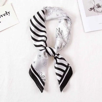 High-end 90cm floral black and white striped silk scarf with delicate floral line art tied in a neat knot Striped Flower Black And White
