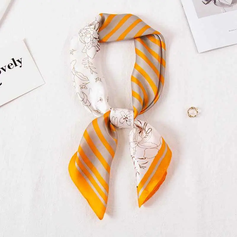 Vibrant orange and gray striped high-end 90cm floral silk feel scarf with delicate floral line art tied in an elegant knot Striped Flower Orange