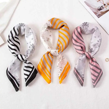 Three high-end 90cm floral silk scarves in black white stripes floral yellow orange stripes and soft pink gray patterns