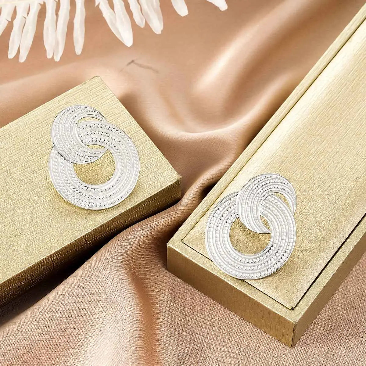 Silver infinity knot earrings with intricate beaded detailing from ins style gold fashion earring collection for affordable luxury Style 1