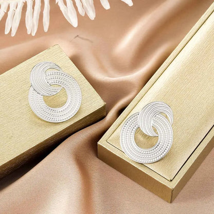 Silver infinity knot earrings with intricate beaded detailing from ins style gold fashion earring collection for affordable luxury Style 1