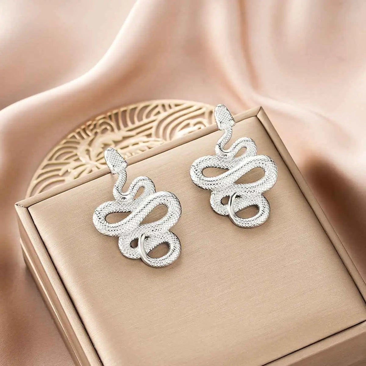 Silver snake-shaped earrings with textured coil design from ins style gold fashion earring collection affordable luxury Style 10