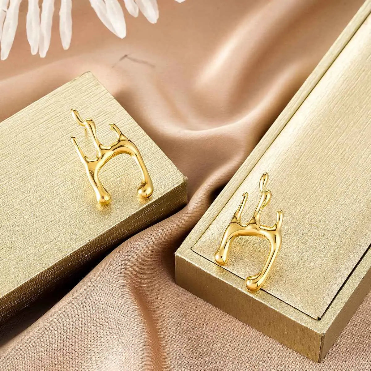 Ins Style gold fashion earring collection featuring gold-colored abstract ear clips with a sleek metallic finish for affordable luxury Style 14