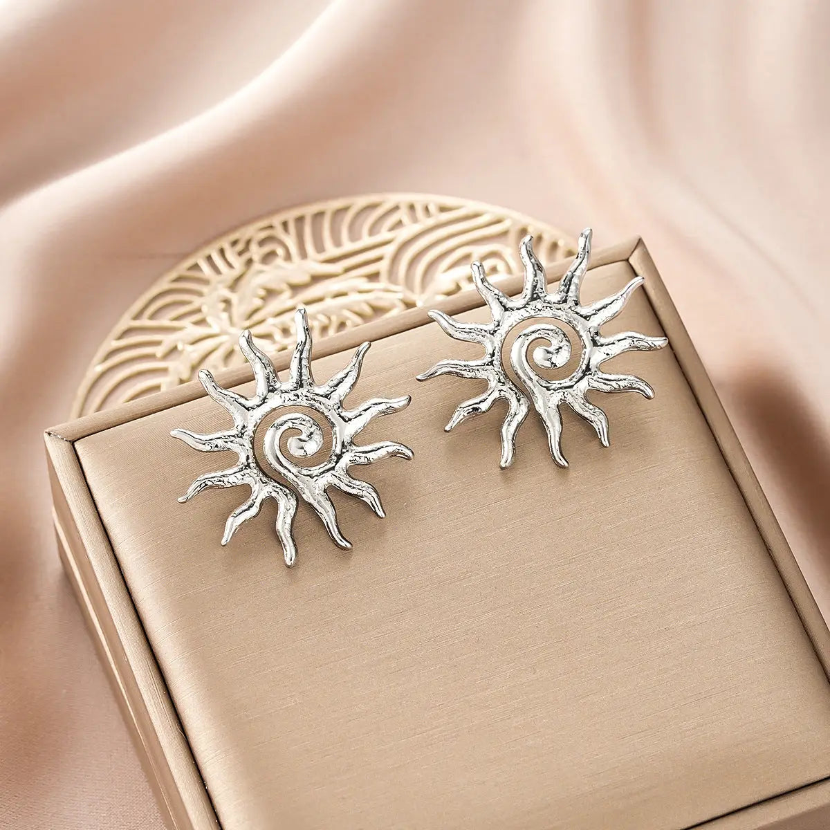Silver sun-shaped stud earrings with intricate spiral centers from ins style gold fashion earring collection affordable luxury Style 23
