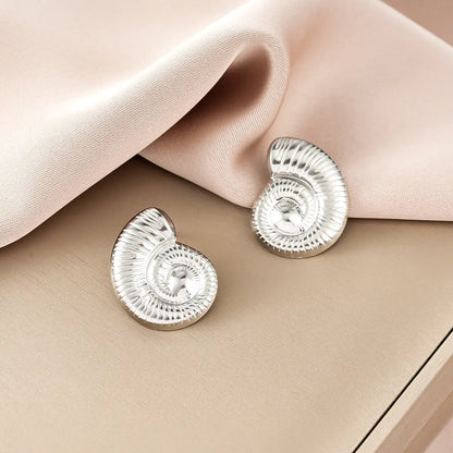 Silver spiral stud earrings with textured ridged surface resembling ammonites from ins style gold fashion earring collection Style 28