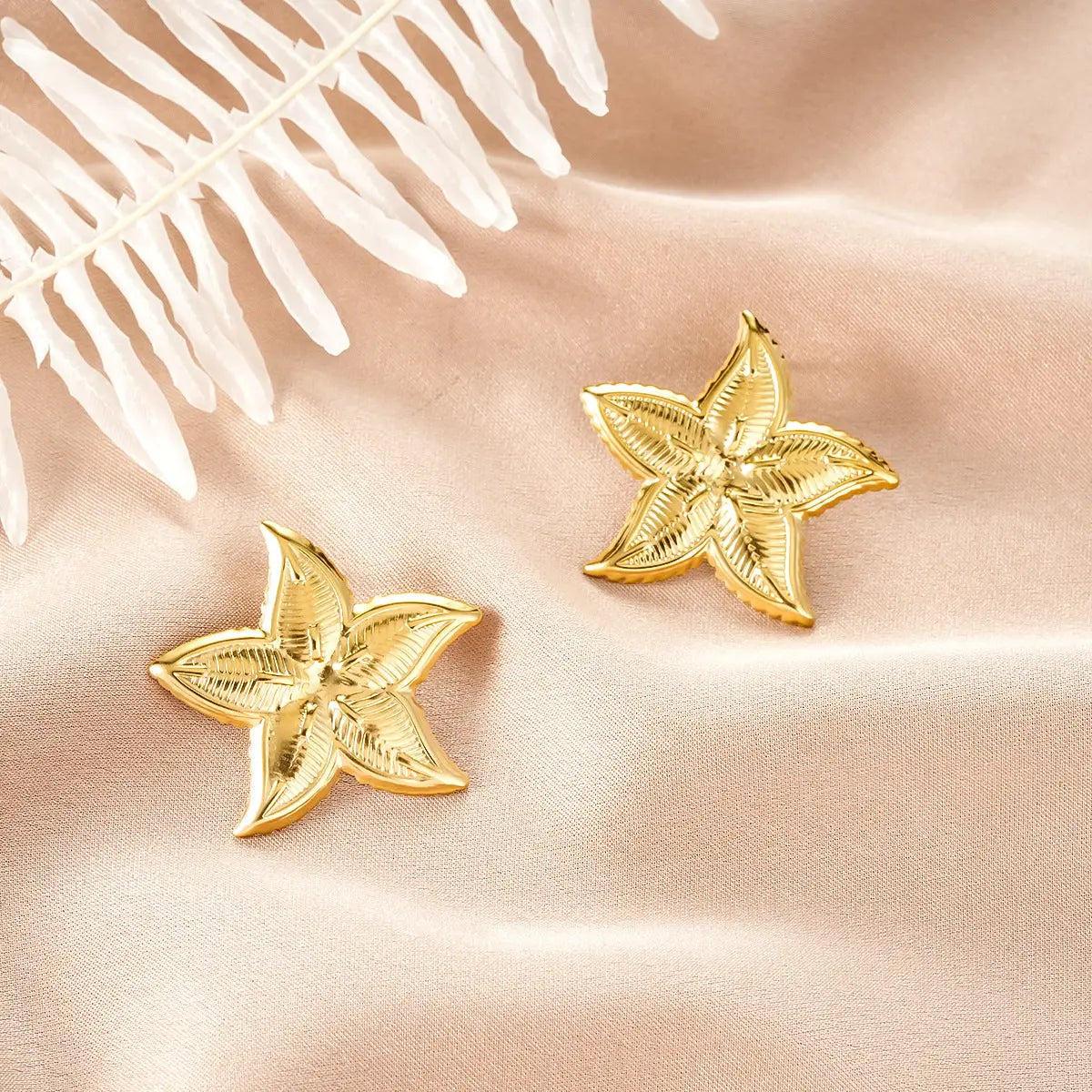 Ins Style gold starfish-shaped earrings with intricate textured detailing from the gold fashion earring collection Style 3