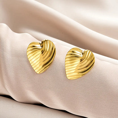 Gold heart-shaped earrings with textured ribbed surface from ins style affordable luxury gold fashion earring collection Style 30