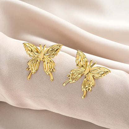 Gold butterfly-shaped stud earrings with intricate wings and polished finish from ins style affordable luxury earring collection Style 31
