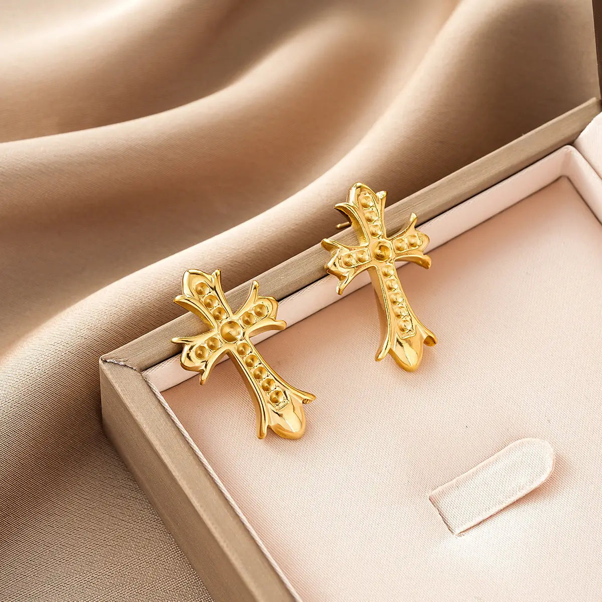Gold cross-shaped earrings with intricate detailing and bead accents from ins style gold fashion earring collection Style 32