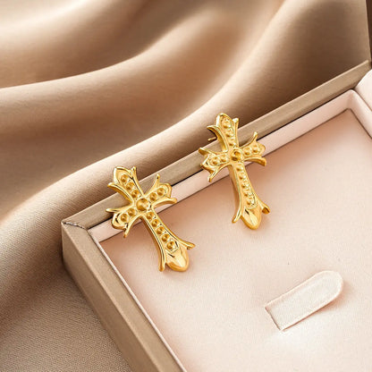 Gold cross-shaped earrings with intricate detailing and bead accents from ins style gold fashion earring collection Style 32