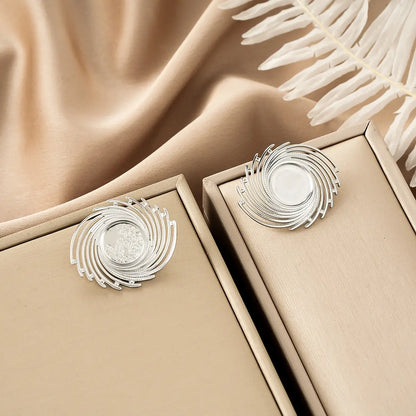 Silver spiral brooches with central mirrored disc in beige boxes from ins style gold fashion earring collection affordable luxury Style 36