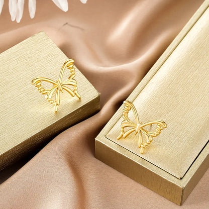 Gold fashion earring collection featuring butterfly-shaped earrings with intricate openwork for affordable luxury style Style 4