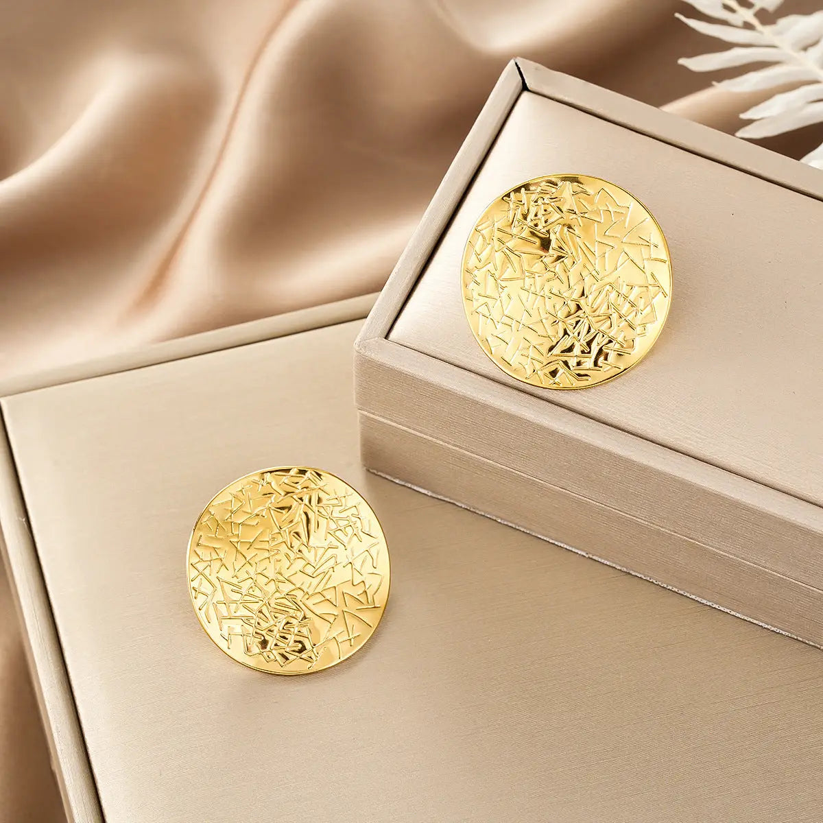 Ins style gold fashion earring collection featuring a gold circular pin with intricate geometric etching design Style 42
