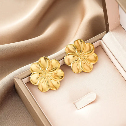 Golden flower-shaped stud earrings with polished metallic finish from ins style gold fashion earring collection affordable luxury Style 47
