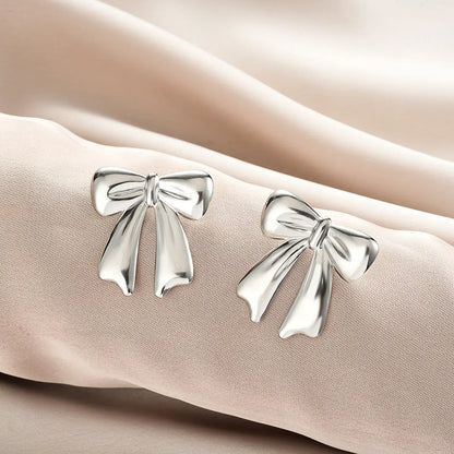 Silver bow-shaped stud earrings with polished finish from ins style gold fashion earring collection affordable luxury Style 48