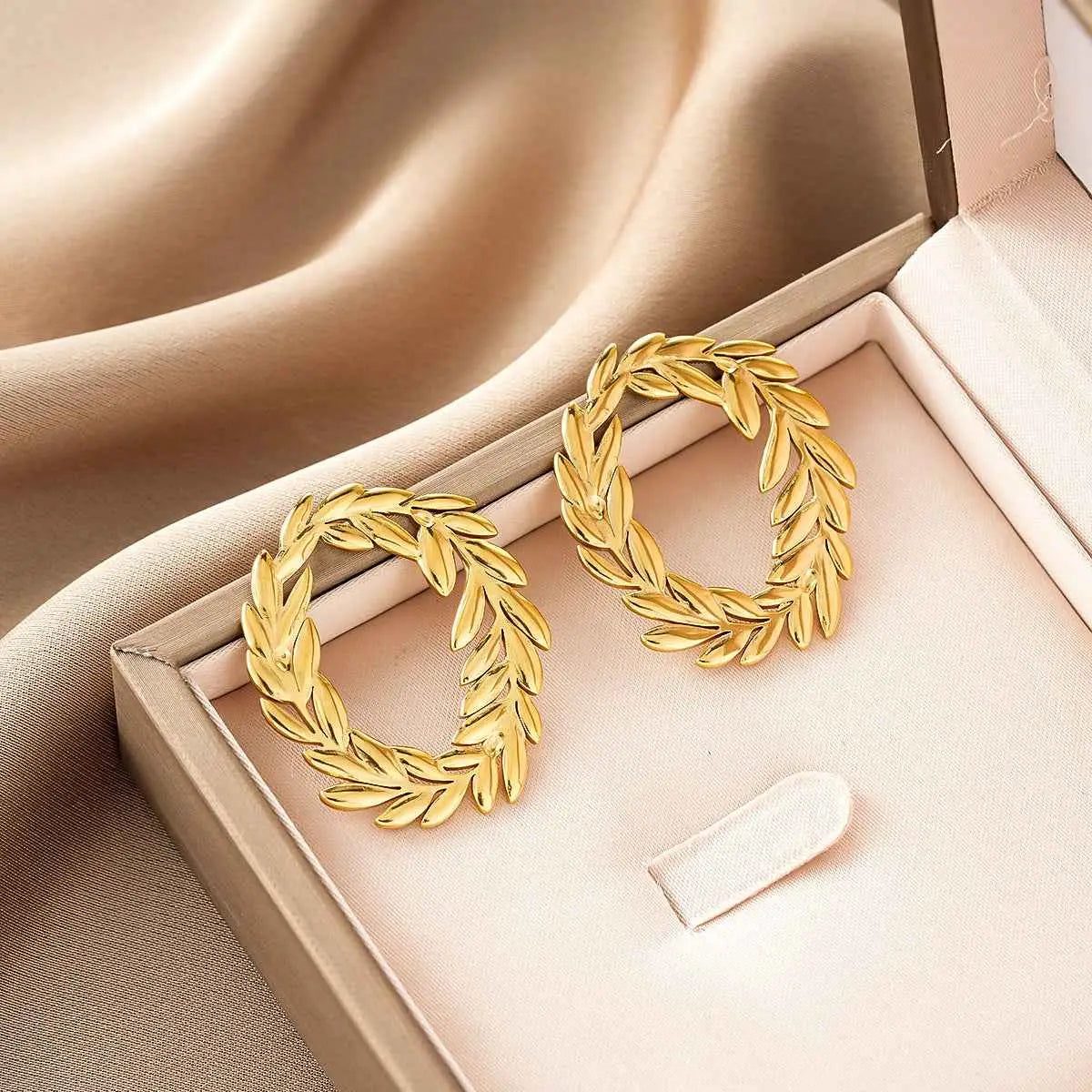 Ins style gold fashion earring collection featuring gold-colored hoop earrings with intricate laurel wreath design affordable luxury Style  49