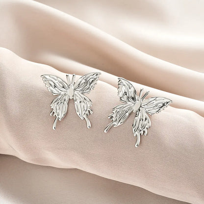 Delicate silver butterfly stud earrings with intricate wing detailing from ins style gold fashion earring collection offering affordable luxury Style 54