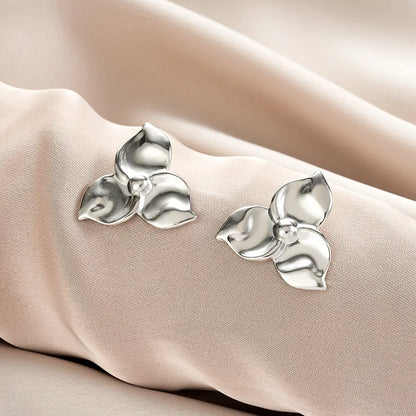 Silver flower-shaped stud earrings with polished metallic finish from ins style gold fashion earring collection affordable luxury Style 57