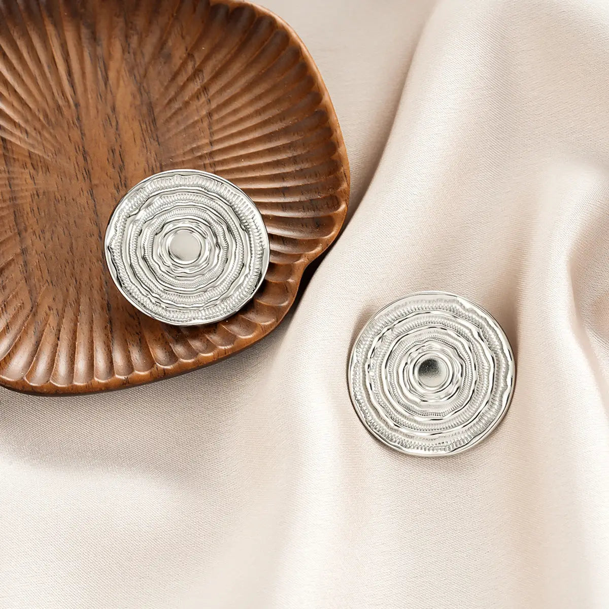 Silver circular button with ridged texture and central hole from ins style gold fashion earring collection affordable luxury Style 58
